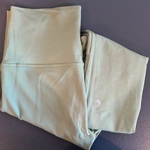 Ivivva leggings, olive green, with netting on legs, Size 10